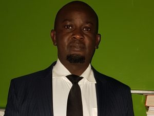 DR. MICHAEL WAINAINA GITHII